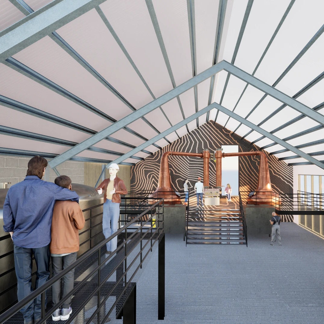 People observing a modern architectural design with geometric ceiling and wall patterns.